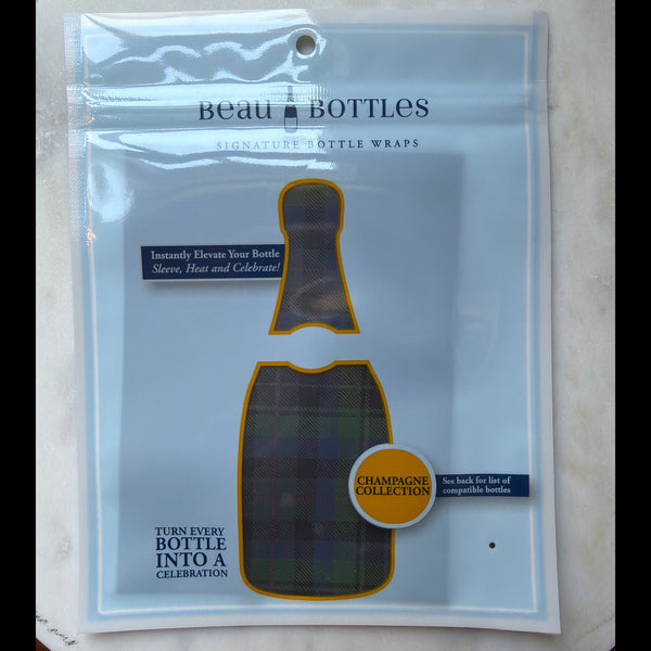 Packaging for Beau Bottles Champagne Collection, Blue and Green Christmas Tartan bottle wrap designed to elevate and decorate bottles for gifts and entertaining, available at Knotty and Board.