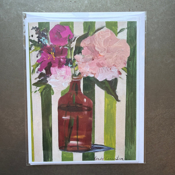 Apothecary Stripes Greeting Card featuring a painted illustration of a brown apothecary jar holding pink and purple flowers against a green and white striped background.
