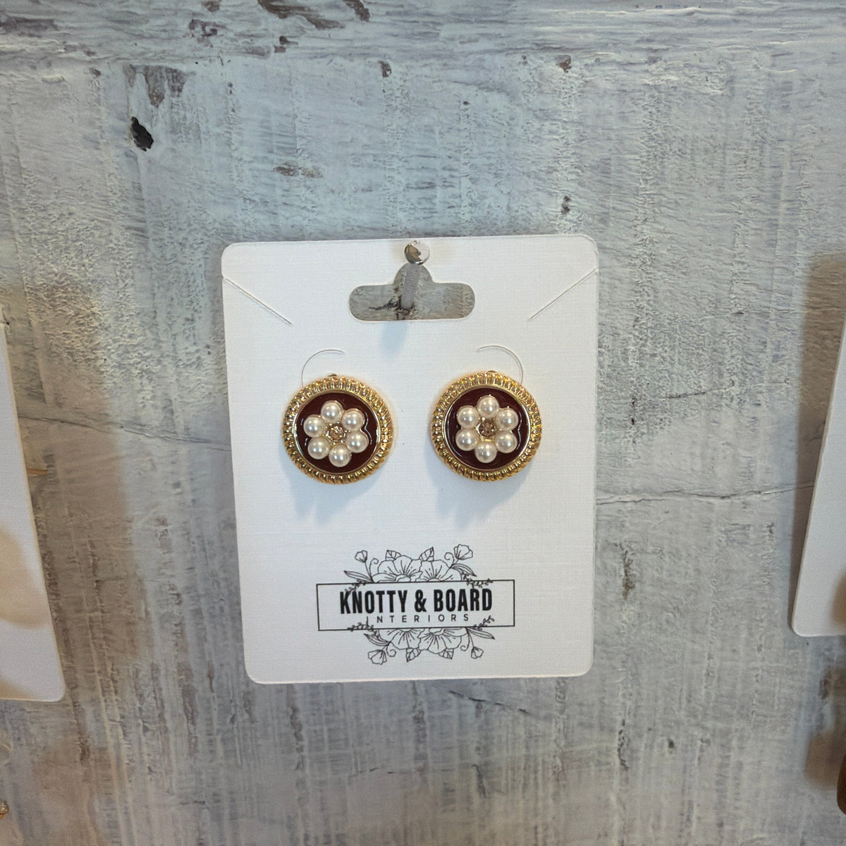 Chic Vintage Floral Drop Earrings featuring a pearl-centered floral design with gold-tone trim, displayed on a Knotty and Board card, perfect for gifts and jewelry decor.
