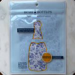 Packaging of Beau Bottles Champagne Collection, Grandmillenial Blue Floral featuring blue floral printed bottle wraps designed to elevate and decorate champagne bottles, offered by Knotty and Board for unique gifts and decor. 1