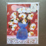 Seedlings Cards, Abundance Birthday featuring a vibrant floral illustration of white and yellow flowers in a blue vase on a red patterned background, perfect for gifts and decor from Knotty and Board. 1