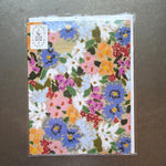 Seedlings Cards, Flourish, Love & Friendship featuring a vibrant floral design with colorful flowers in blue, pink, orange, and white, perfect for thoughtful gifts and decor from Knotty and Board. 1