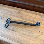 Flame On Main Wick Trimmer in matte black metal, designed for precise candle wick maintenance, displayed on rustic wooden surface, ideal for decor and gifting from Knotty and Board. 1