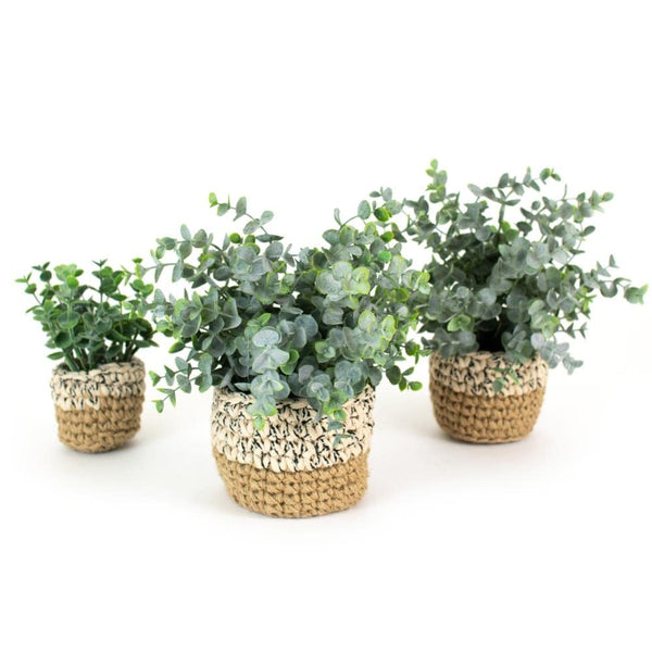 Artificial Eucalyptus Plants in Woven Pot - Medium featuring lush green leaves in a natural woven basket, perfect decor gift for kitchen or dining by Knotty and Board.