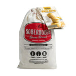 Bag of Soberdough Brew Bread, Mimosa Muffins artisan beer bread mix with a red logo, promoting handcrafted natural mix from Nashville, Tennessee, ideal for kitchen and entertaining gifts. 1