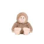 Soft and cuddly Warmie Bigfoot plush toy with a smiling face and large feet, perfect as a cozy gift or charming decor for any room from Knotty and Board. 1