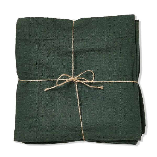 Slub Cotton Everyday Napkins, Set of Four, Dark Green neatly folded and tied with natural twine, perfect for adding cozy decor to kitchen and dining spaces with Knotty and Board style.