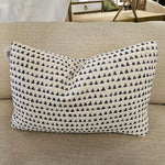 Soft decorative pillow with a repeating triangular pattern in blue and white, perfect for adding cozy style to any room with the Designer Pillow Line Triangular Uniform. 1