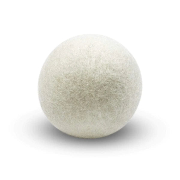 A single white Wool Dryer Ball made of natural wool fibers, perfect for eco-friendly laundry care and a thoughtful gift from Knotty and Board, every room needs a little Knotty and Board.