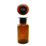 Glass Bottle with Stopper, Brown, 16 oz, amber glass container with a round glass stopper, suitable for kitchen or decor use, offered by Knotty and Board, your source for unique gifts and entertaining essentials. 1