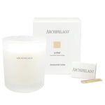 Archipelago Luna Boxed Candle, 10 oz with minimalist white packaging, perfect for adding elegant decor and fragrant ambiance to any kitchen or dining space, available at Knotty and Board. 1