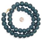 Recycled Glass Beads 18 mm Assorted Colors displayed as a dark teal beaded necklace with large round beads next to a penny for size comparison, ideal for decor or gifts from Knotty and Board.