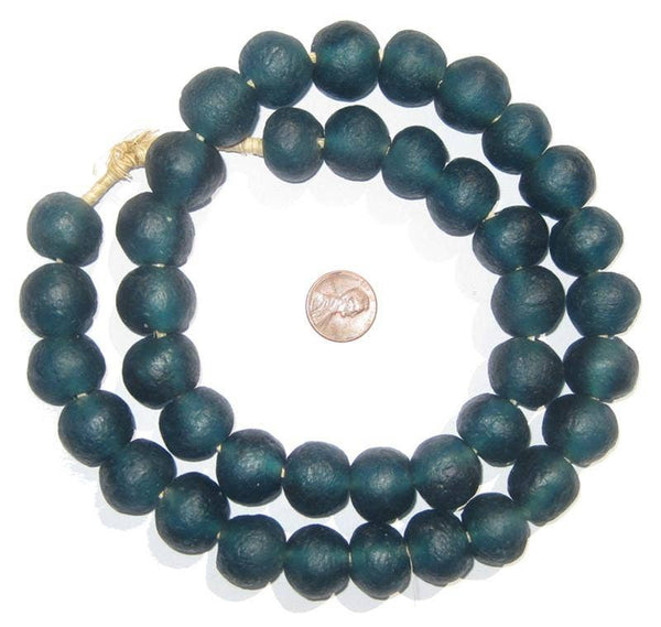 Recycled Glass Beads 18 mm Assorted Colors displayed as a dark teal beaded necklace with large round beads next to a penny for size comparison, ideal for decor or gifts from Knotty and Board.