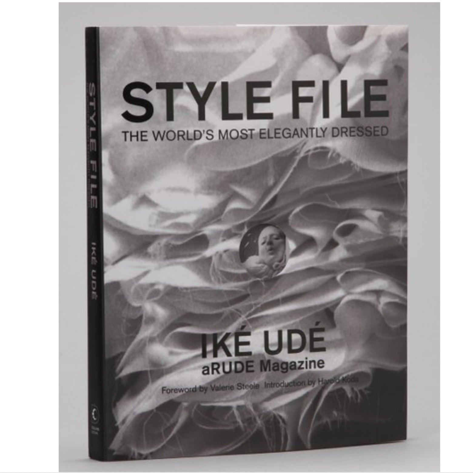 Style File book by Ike Udé displayed with abstract, flowing fabric-like cover design, ideal for decor and gifts from Knotty and Board, every room needs a little Knotty and Board.