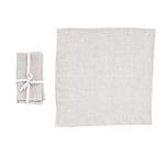 Stonewashed Square Linen Napkin Set, Ivory, 18 in. displayed with one napkin unfolded and three neatly folded and tied, perfect for kitchen and dining decor from Knotty and Board. 1
