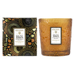 Voluspa Baltic Amber Classic Candle, 9 oz. displayed with its decorative amber glass container and intricately designed black and gold packaging, perfect for home decor and gifts. 1