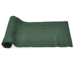 Rolled fabric showcasing the Slub Cotton Everyday Table Runner, 72 in., Dark Green, perfect for dining and kitchen decor from Knotty and Board’s curated gift collection. 1