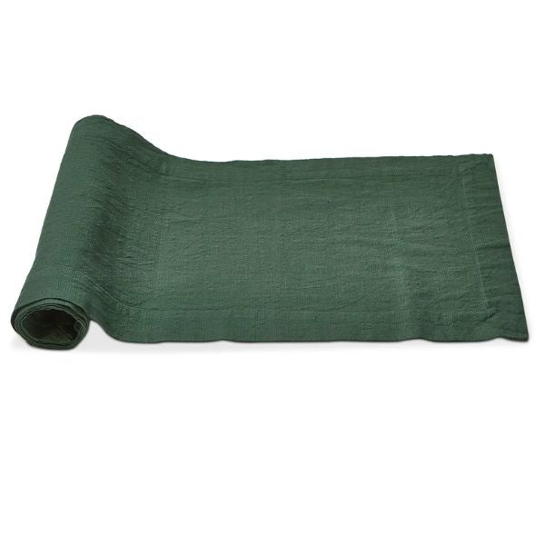 Rolled fabric showcasing the Slub Cotton Everyday Table Runner, 72 in., Dark Green, perfect for dining and kitchen decor from Knotty and Board’s curated gift collection.