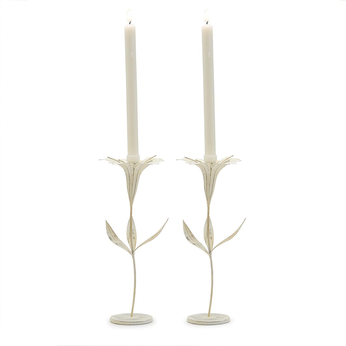 Pair of elegant cream-colored Blooming Flower Candleholder with slender stems and leaf accents, perfect for adding charm to dining or entertaining spaces and gifts.