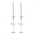Pair of elegant cream-colored Blooming Flower Candleholder with slender stems and leaf accents, perfect for adding charm to dining or entertaining spaces and gifts. 1