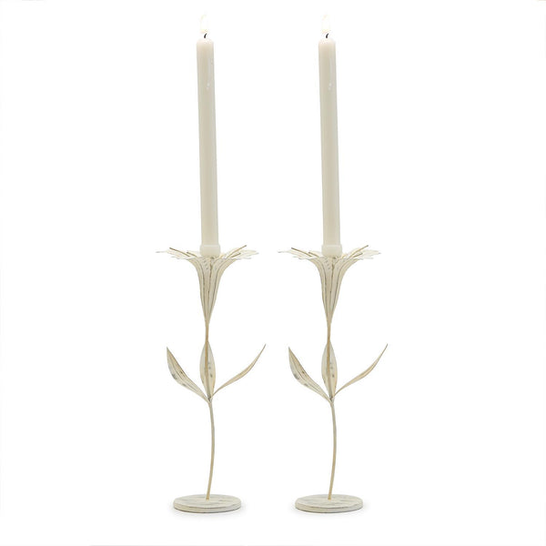 Pair of elegant cream-colored Blooming Flower Candleholder with slender stems and leaf accents, perfect for adding charm to dining or entertaining spaces and gifts.