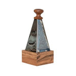 Stainless Steel Grater w/ Acacia Wood Handle, Natural standing on a wooden base, combining durable metal grating surfaces with a warm natural wood handle, ideal for kitchen and dining gifts from Knotty and Board. 1