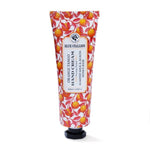 Tube of Blue Stallion Hand Cream, 100 ML, Orange Tango with a bright orange fruit pattern on the packaging, displayed against a white background, perfect for gifts and decor at Knotty and Board. 1