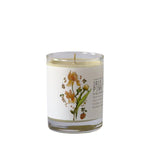 Just Bee Iris & Pink Peppercorn, 7 oz. candle with a floral label featuring orange iris flowers, perfect for Knotty and Board curated decor and gifts for kitchen and dining spaces. 1