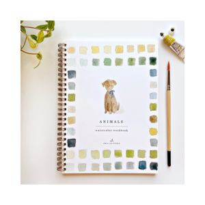 Watercolor Workbook, Animals featuring a spiral-bound notebook with a painted dog on the cover, surrounded by a palette of watercolor swatches, a paintbrush, and a tube of paint, perfect for art lovers and gift shoppers from Knotty and Board.