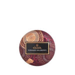 Voluspa Foraged Wildberry Mini Tin, 4 oz. candle with a decorative burgundy and gold patterned lid, perfect for adding a fragrant touch to kitchen or dining spaces. 1