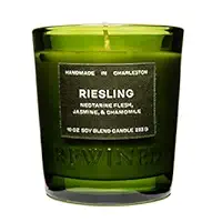 Rewined Candle 6oz Riesling in a green glass container with a label featuring notes of nectarine flesh, jasmine, and chamomile, perfect for cozy home decor and gifts.