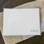 Note Card Set Pack of 10 - Huntersville featuring simple elegant design on white cards, perfect for gifts and home decor from Knotty and Board, displayed on textured fabric. 1