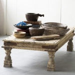 Rustic wooden table with carved legs displaying various wooden bowls and trays, styled as Primitive Bajot, found, varies, perfect for home decor and gifts from Knotty and Board. 2