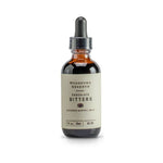 Bourbon Barrel Foods Woodford Chocolate Bitters, 2 oz. bottle in amber glass with dropper cap, perfect for kitchen gifts and entertaining, available at Knotty and Board. 1