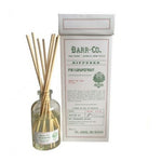 Barr Co Fir & Grapefruit Diffuser, 8 oz with natural reeds and a glass bottle, styled as a curated home decor gift, featured by Knotty and Board for kitchen and dining ambiance. 1