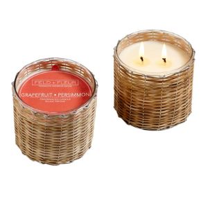 Two Hillhouse, Handwoven Candle 12oz., Grapefruit Pomelo candles in woven natural rattan holders, one lit with two flames and one closed with a grapefruit and persimmon label, ideal for home decor and gifts.