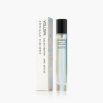 Voluspa, Eau De Parfum, 10 ml, Vanilla Visions in a sleek glass roller bottle with black cap next to its elegant white and iridescent packaging, perfect gift from Knotty and Board. 1