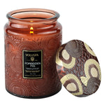 Voluspa Forbidden Fig Candle Jar, Large, 18 oz burning in a decorative embossed glass jar with a patterned lid, perfect for Knotty and Board décor and gifts collection. 1