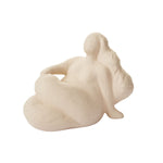 Minimalist beige abstract sculpture of a reclining woman with flowing hair, perfect for modern decor, named Yazmin Sculpture 10.25 x 5.25 x 7. 1