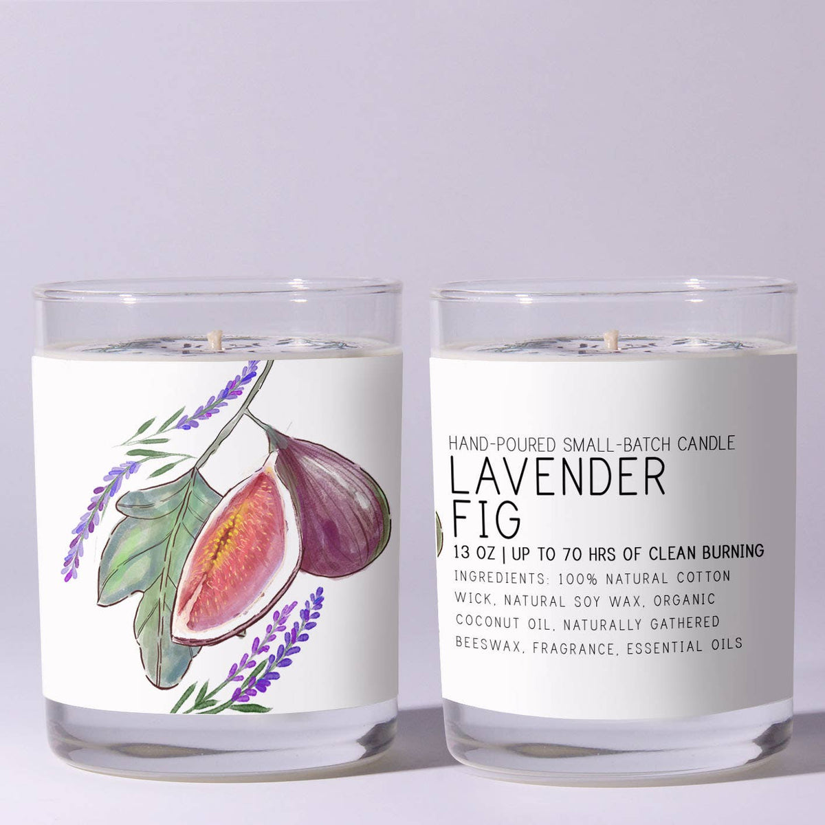 Just Bee Lavender Fig Candle - 7 oz in clear glass with illustrated fig and lavender design, offered by independent brick and mortar Knotty and Board for home decor and gifts.