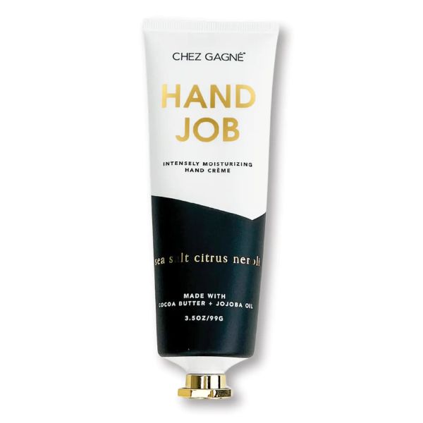 Tube of Hand Creme, Hand Job, Sea Salt Citrus and Neroli with gold and black packaging, emphasizing moisturizing formula made with cocoa butter and jojoba oil, featured by Knotty and Board for decor and gifts.