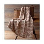 Soft cotton throw draped over chair with baskets in rustic wooden setting, featuring the Fennel Botanical Print Cotton Throw, 50 X 60 in., perfect for cozy decor and gifts from Knotty and Board. 1