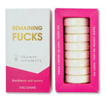 Packaged set of eight Shower Steamers, Remaining F*cks, Blackberry Quince scent, featuring white round tablets in a pink and white box with gold and white text, stylish home decor gift idea. 1