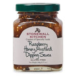 Stonewall Kitchen Raspberry Honey Mustard Dipping Sauce, 8.75 oz. in a clear glass jar with green lid, perfect for kitchen gifts from Knotty and Board, adding flavor to dining and entertaining. 1
