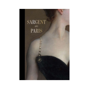 Close-up of a woman in an elegant black dress with beaded straps, showcasing refined style and sophistication, featured in Sargent and Paris.