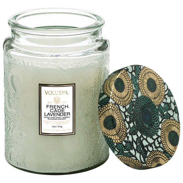 Voluspa French Cade Large Jar Candle, 18 oz with embossed glass jar and decorative floral lid, perfect for elegant home decor and thoughtful gifts from Knotty and Board.