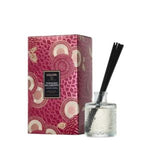 Voluspa Foraged Wildberry Reed Diff 3.4 oz with decorative berry-patterned packaging and clear glass diffuser bottle with black reeds, ideal for home decor and gifts at Knotty and Board. 1