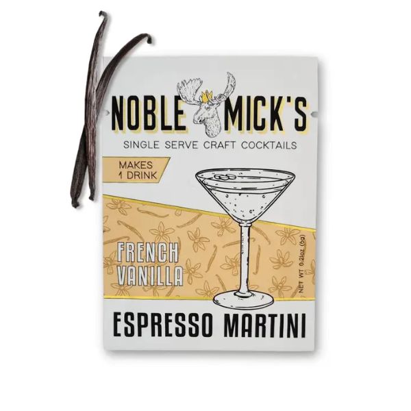 Noble Mick's Single Serve Craft Cocktail, French Vanilla Espresso Martini packet displayed next to two vanilla beans, perfect for kitchen or entertaining gifts at Knotty and Board.