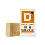 Duke Cannon Brick of Soap, 10 oz., Sawtooth with rugged beige brick soap next to white and orange labeled box, a unique gift for home decor and bathroom essentials from Knotty and Board. 1