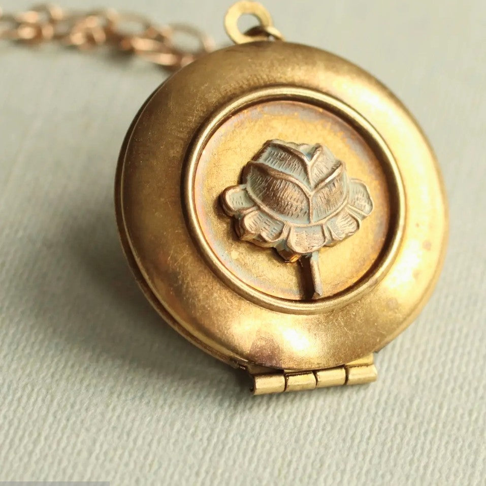Tudor Rose Locket Necklace, 18 in. featuring a vintage-style gold-tone round locket with a raised rose design, perfect jewelry gift from Knotty and Board for adding charm to any outfit.